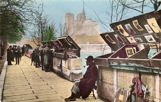 Les bouquinistes Quai de la Tournelle. Carte postale publiée dans les années 1950